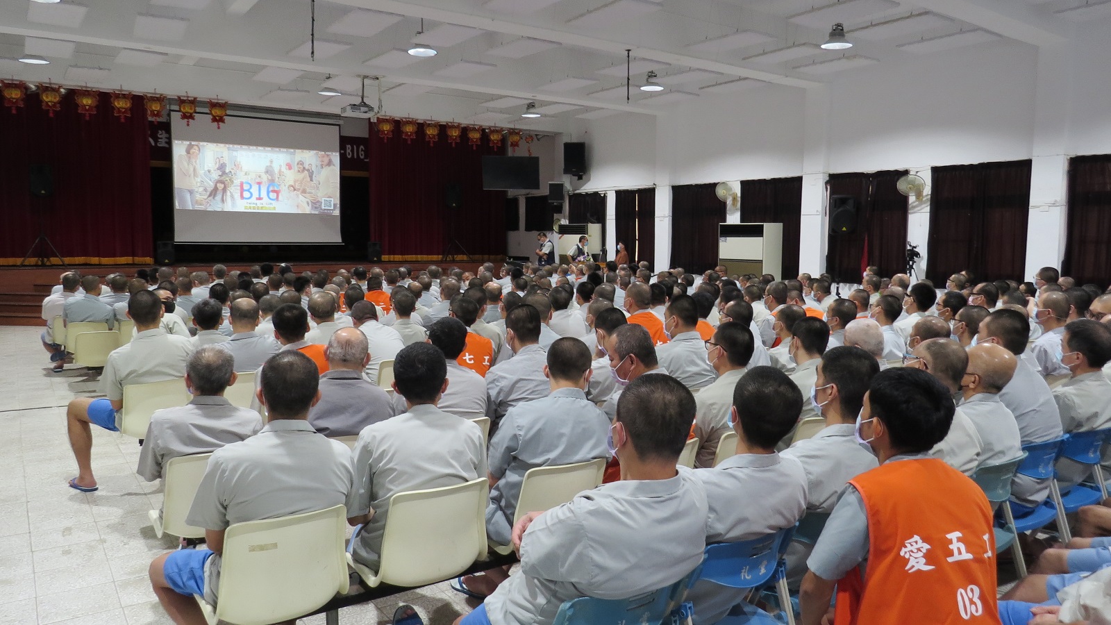 Inmates watching “BIG” in the auditorium.